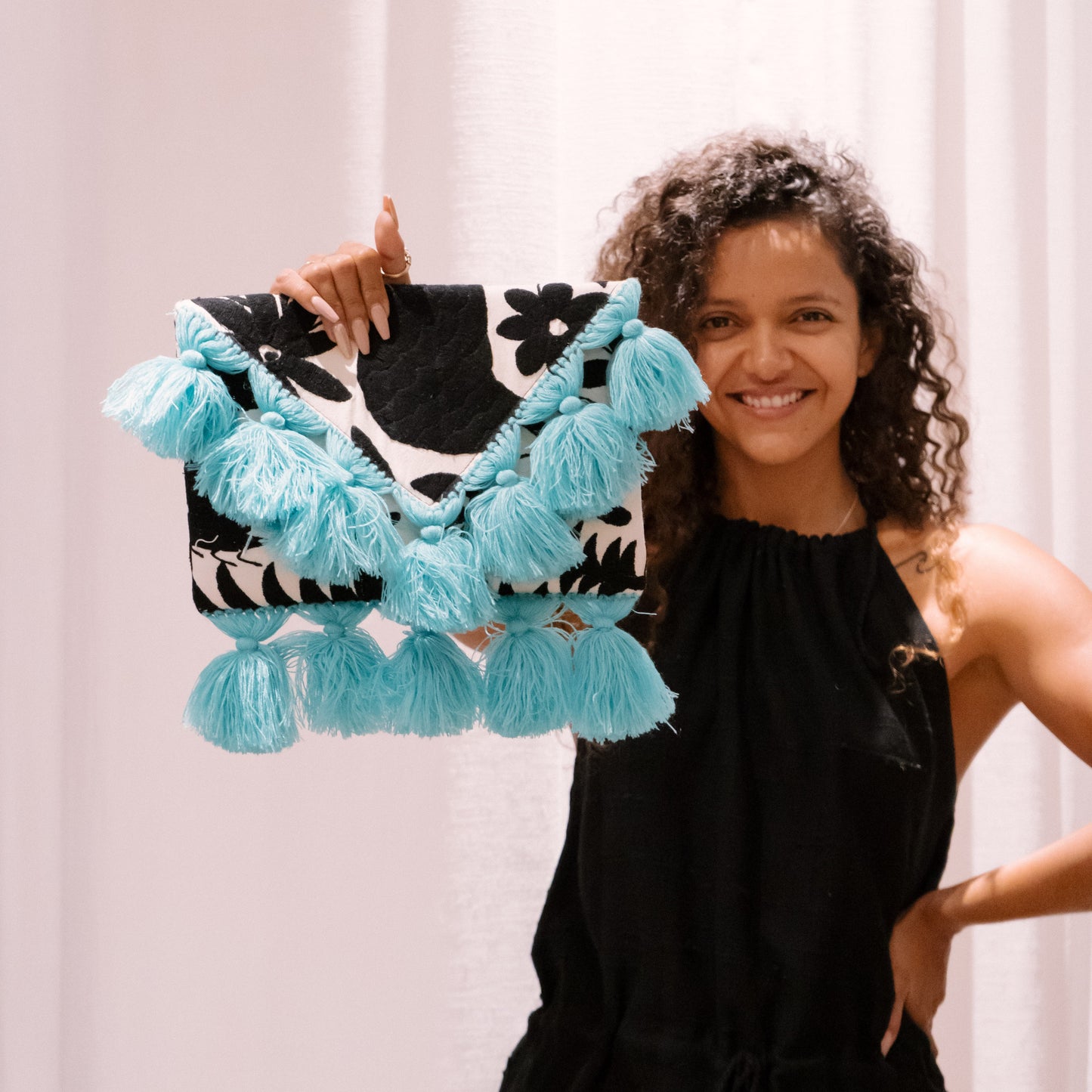 Black Otomi Clutch With Red Tassels